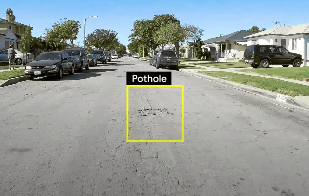 Object detection of a pothole in the street.